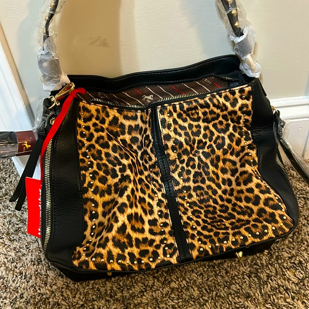 Montana West purse new with tags and adjustable straps, never used